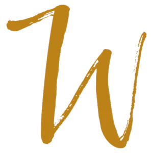 Logo with the words “Wundervoll Zeremonien” in stylized gold and blue text, featuring delicate line art of leaves in light blue beneath the word "Wunder.
