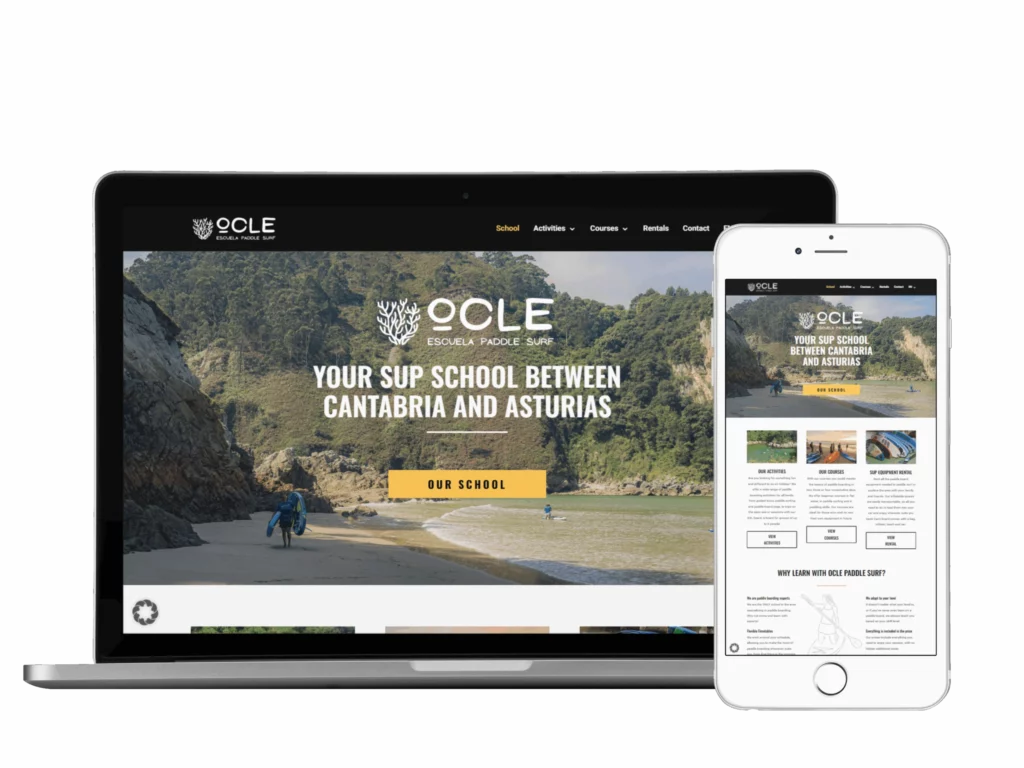 A laptop and a smartphone display the OCLE Escuela Paddle Surf website, featuring a beach scene with cliffs, people paddleboarding, and the text "Your SUP school between Cantabria and Asturias.